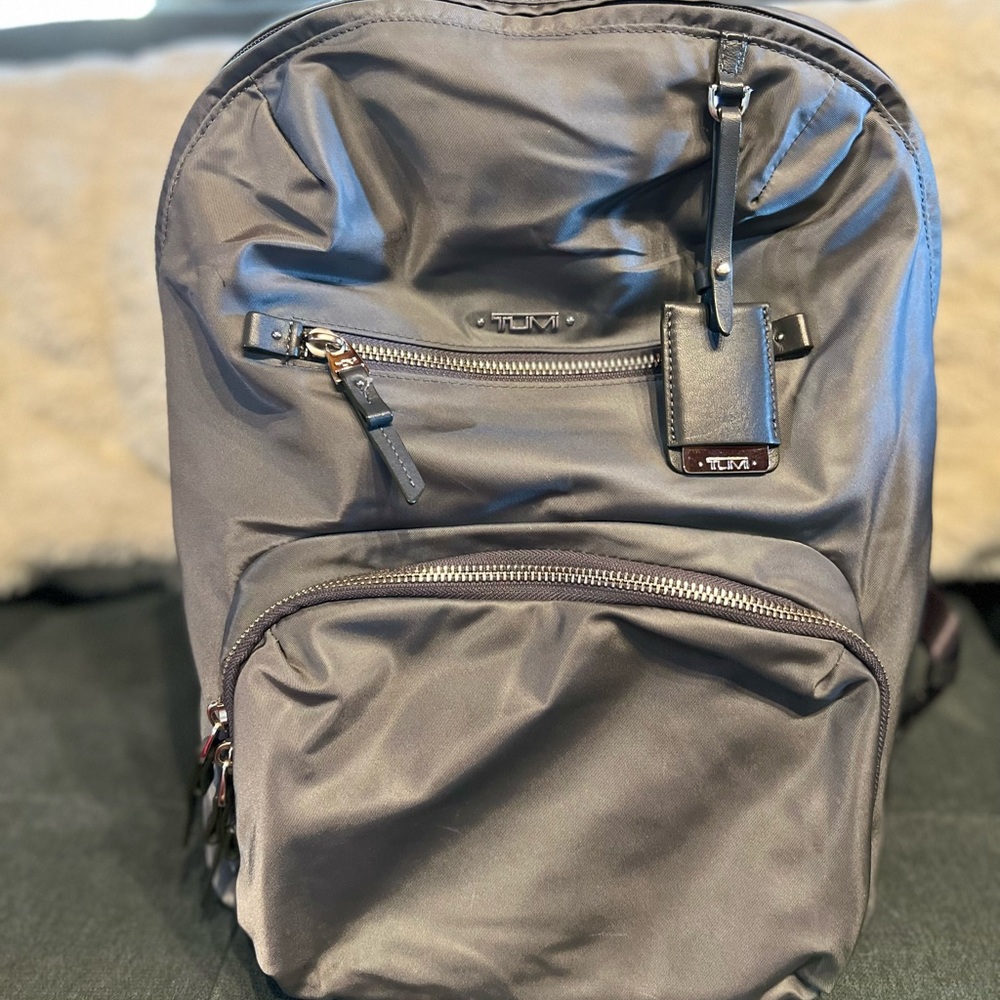 Tumi gray backpack in good condition